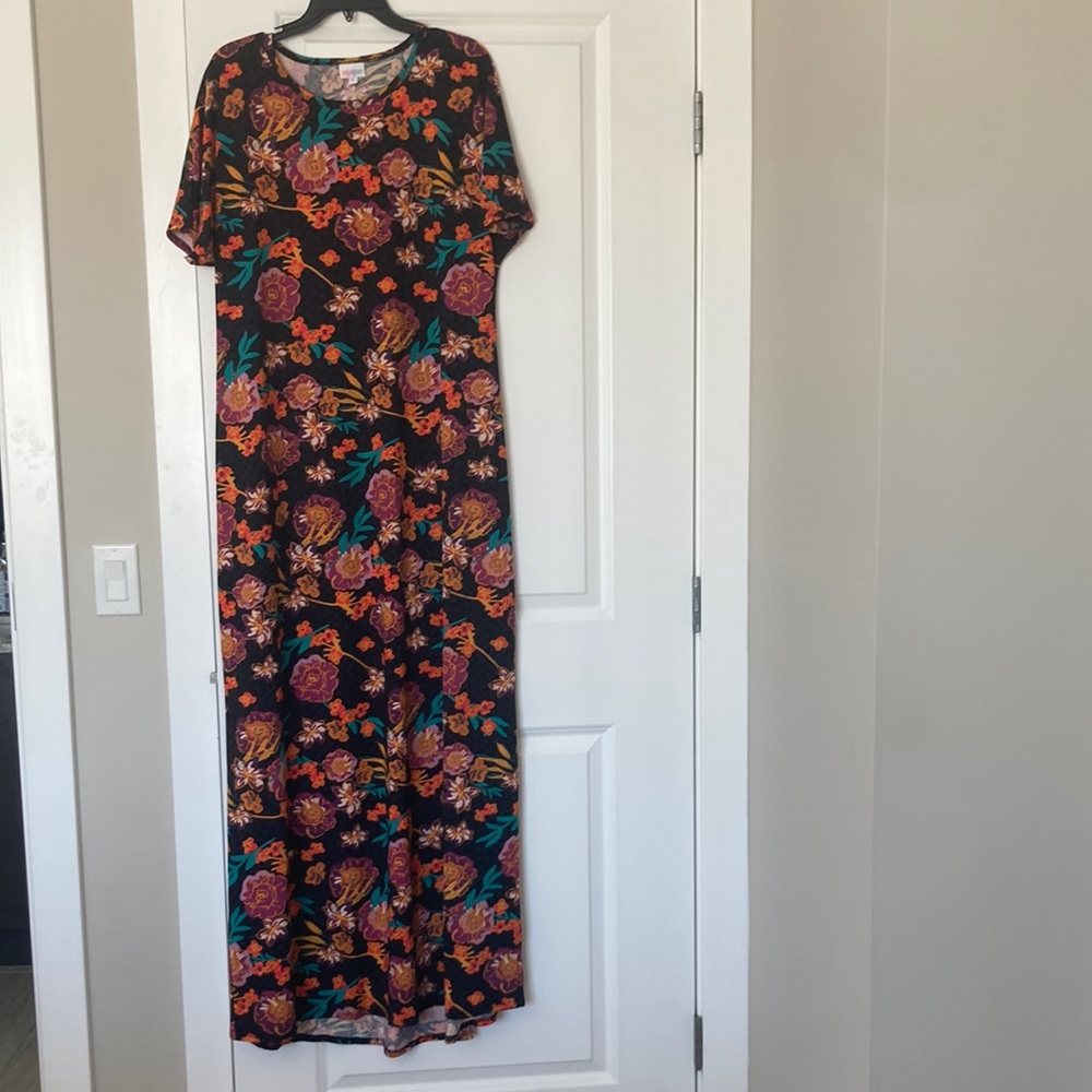 Black background floral dress, NEVER BEEN WORN!!